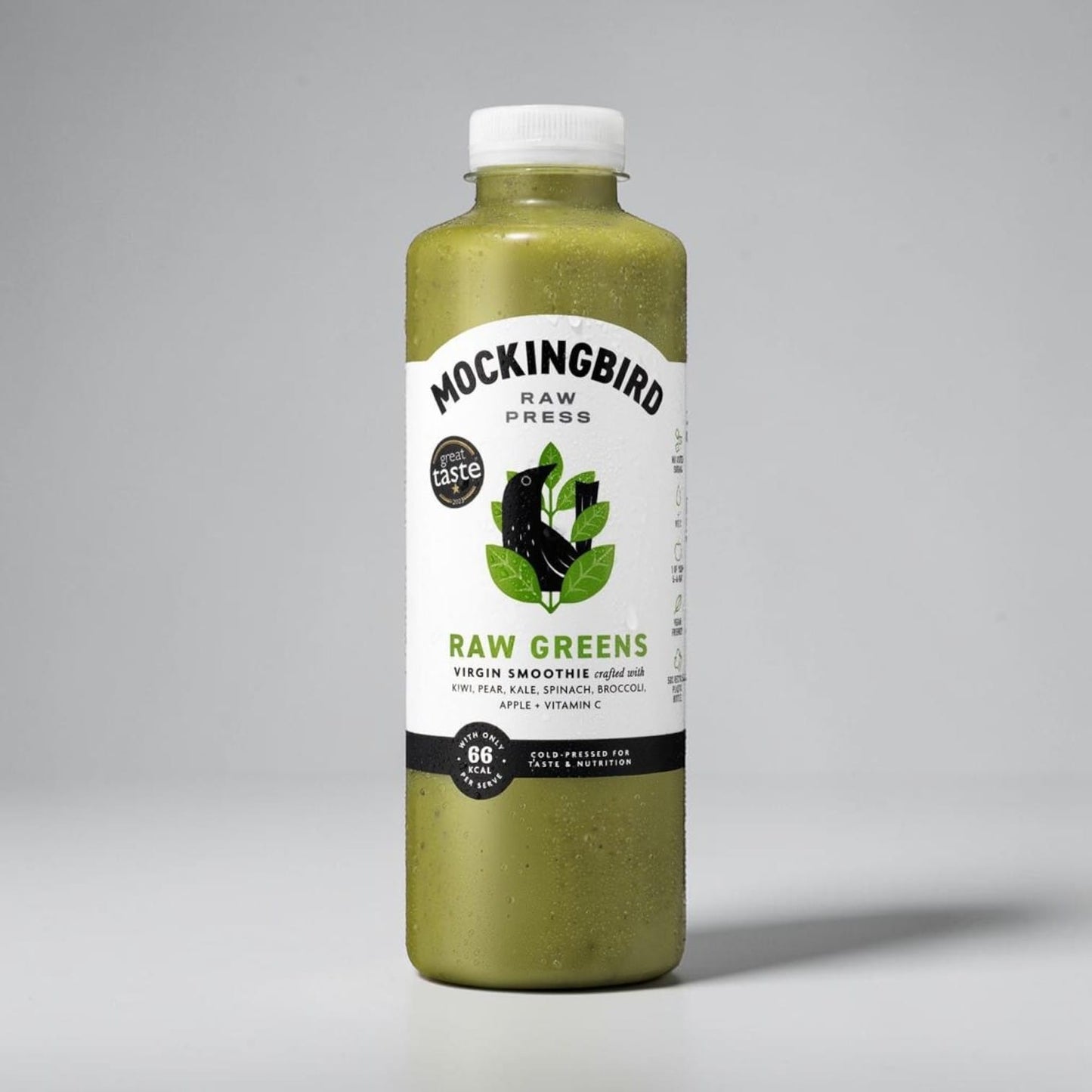 Saporia | Artisan UK Vegan Cheesemonger & Deli Mockingbird Raw Greens cold-pressed smoothie in a clear plastic bottle.