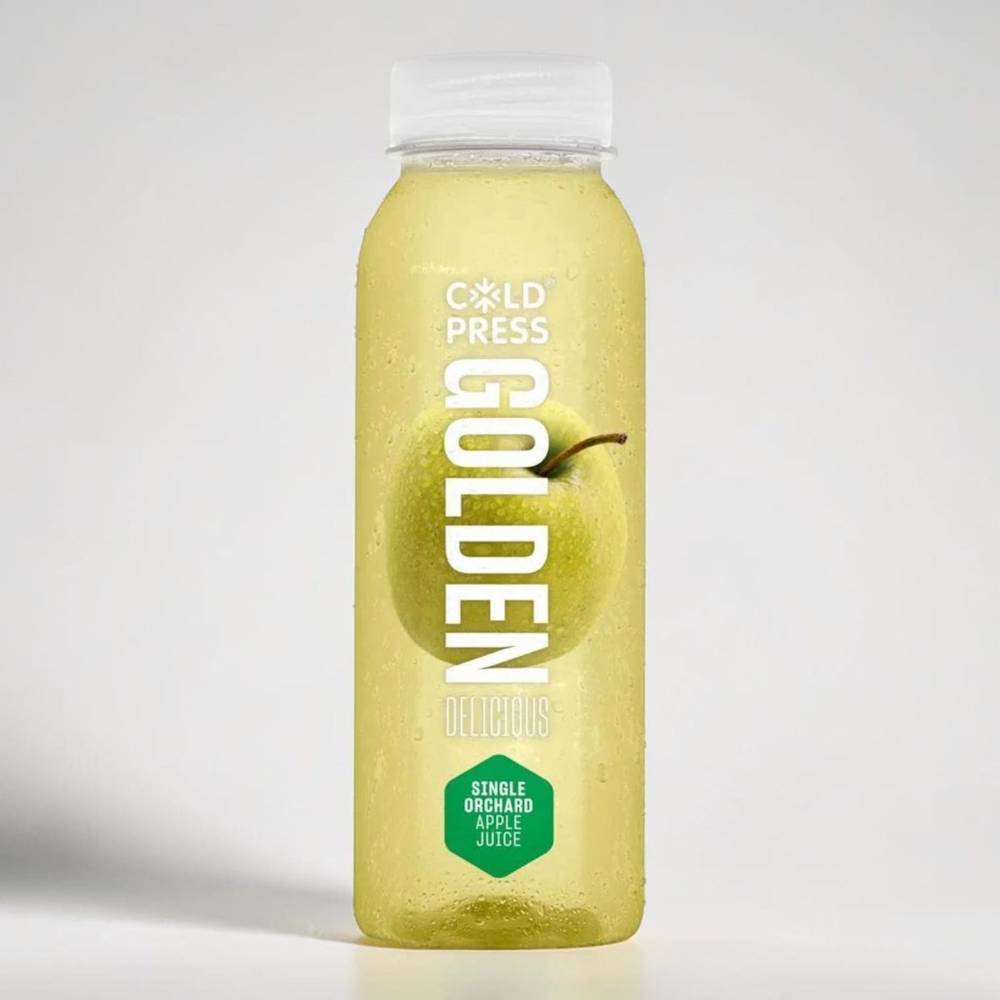 Saporia Golden Delicious single orchard apple juice in a clear bottle with a whole apple visible inside.