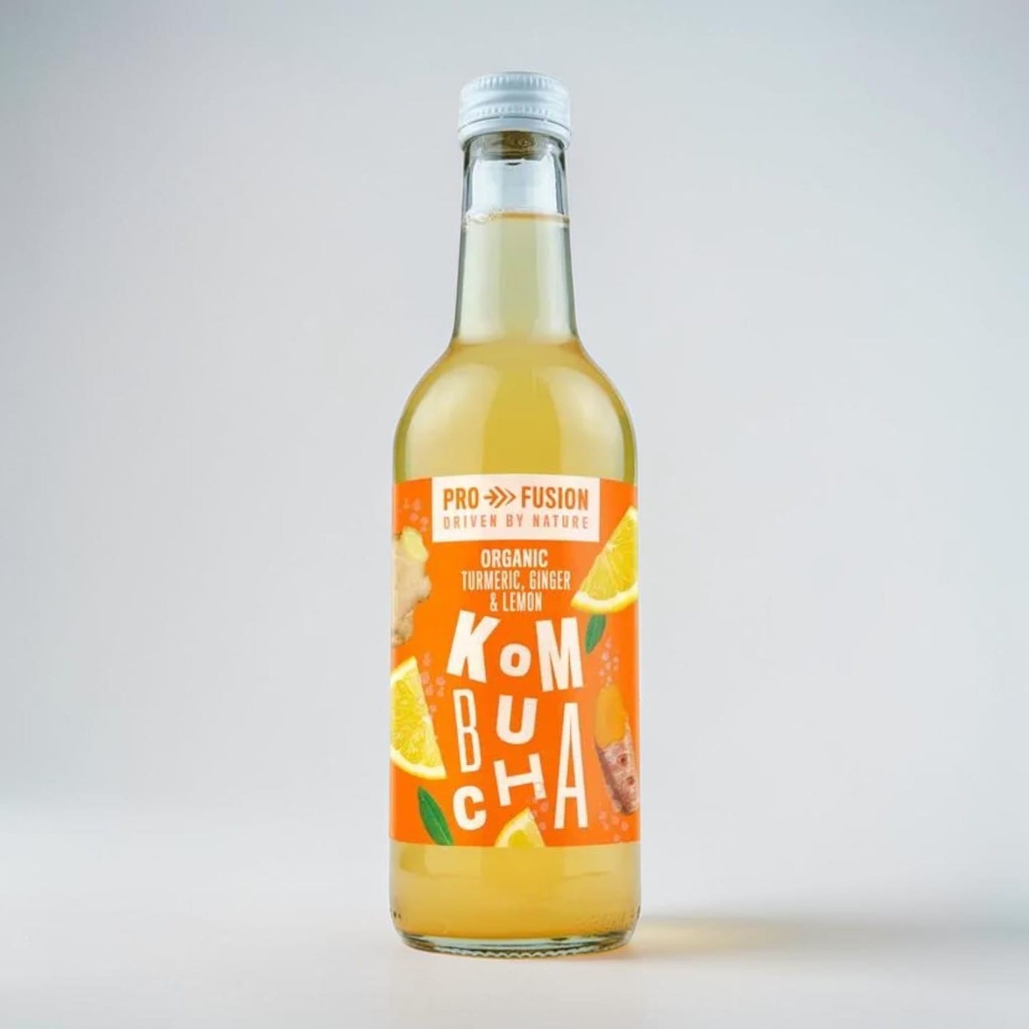 Saporia Profusion organic kombucha with turmeric, ginger, and lemon in a clear glass bottle with an orange label.