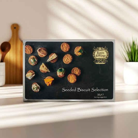 A handcrafted assortment of savoury seeded biscuits, baked with organic ingredients. Perfect for pairing with plant-based cheeses or festive spreads.