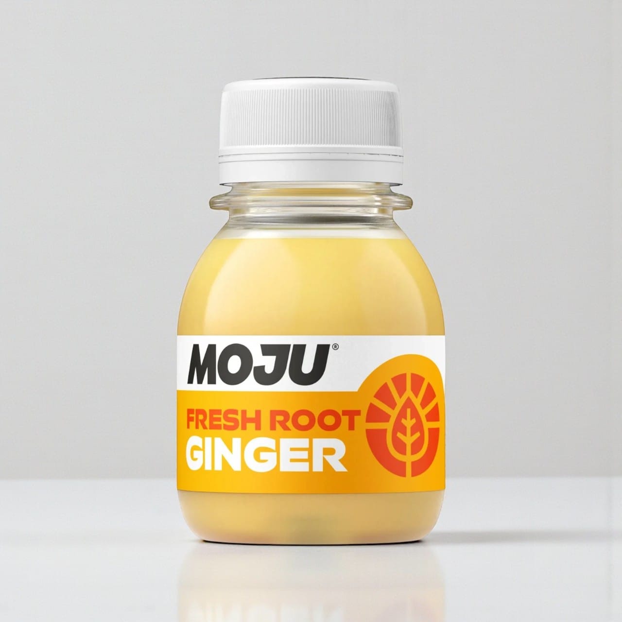 Moju Fresh Root Ginger Vitality Shot, a potent cold-pressed drink with Peruvian ginger, apple, lemon, and acerola cherry.