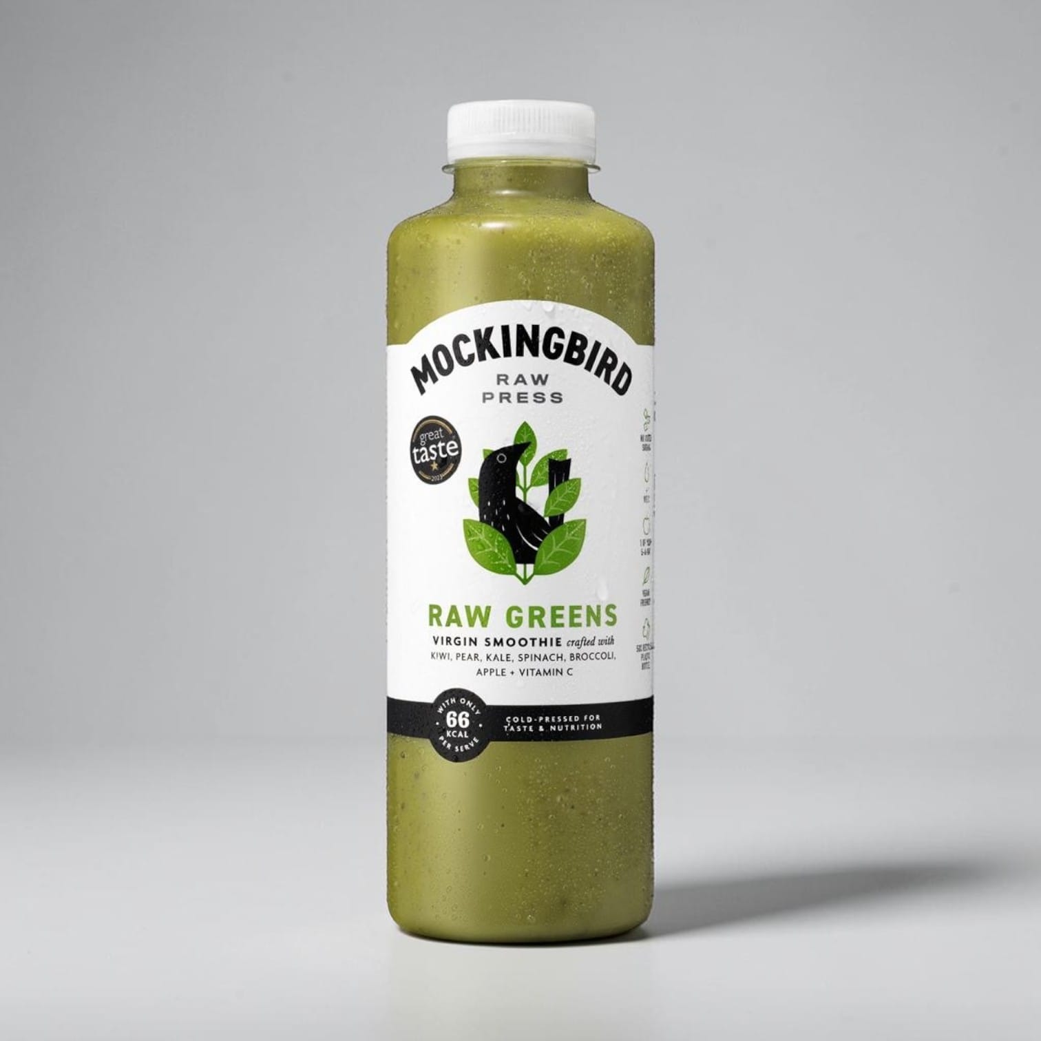 Saporia | Artisan UK Vegan Cheesemonger & Deli Mockingbird Raw Greens cold-pressed smoothie in a clear plastic bottle.