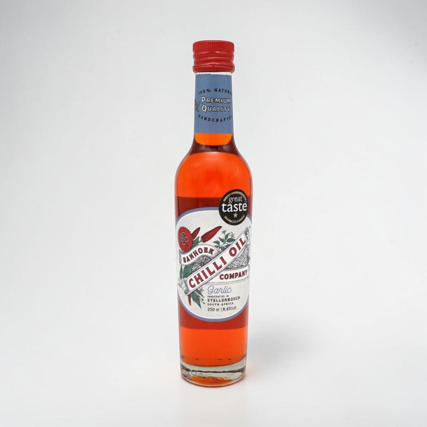 Saporia | Artisan UK Vegan Cheesemonger & Deli Banhoek garlic-infused chilli oil in a 250ml glass bottle.