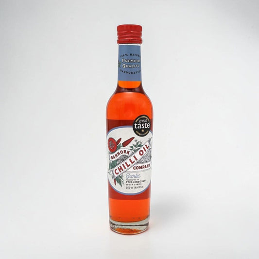 Saporia | Artisan UK Vegan Cheesemonger & Deli Banhoek garlic-infused chilli oil in a 250ml glass bottle.