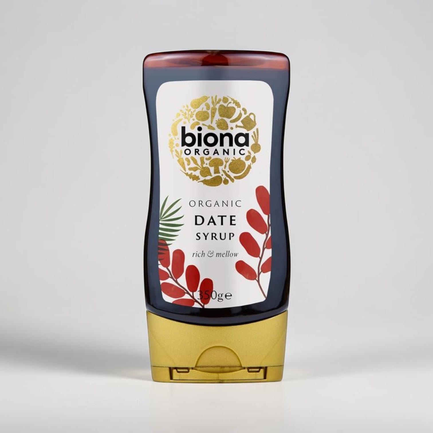 Saporia | Artisan UK Vegan Cheesemonger & Deli Biona organic date syrup in a squeeze bottle with a gold cap.