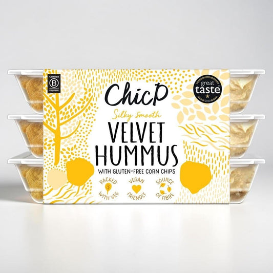 Saporia | Artisan UK Vegan Cheesemonger & Deli ChicP Velvet Hummus snack pack with gluten-free corn chips in three pots.