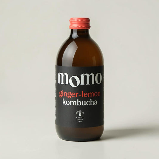 Momo organic ginger lemon kombucha in a glass bottle from Saporia | Artisan UK Vegan Cheesemonger & Deli