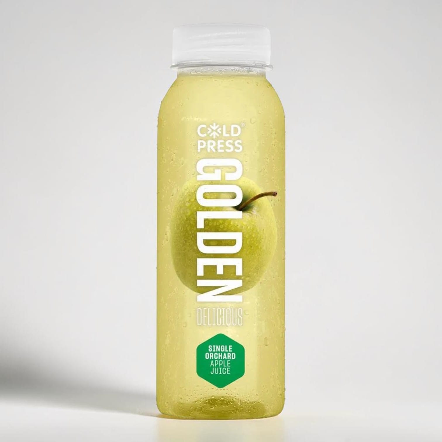 Saporia Golden Delicious single orchard apple juice in a clear bottle with a whole apple visible inside.